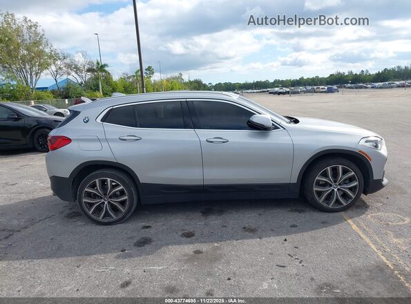 WBXYH9C09L5R51576 2020 BMW X2 Серебряный Вид задней части салона