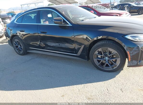 WBY43AW06RFS01660 2024 BMW I4 Black Front view