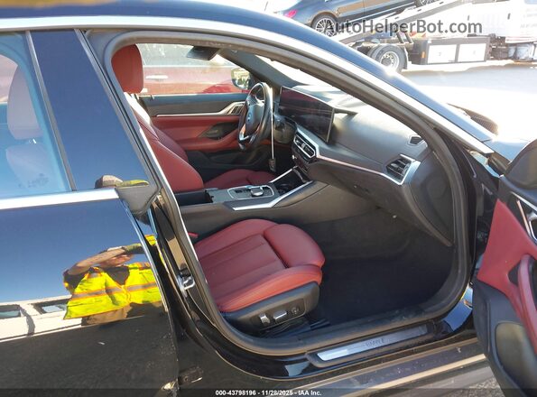 WBY43AW06RFS01660 2024 BMW I4 Black Front interior view