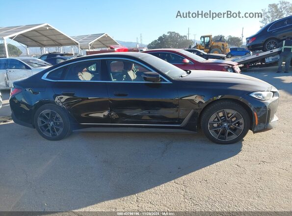 WBY43AW06RFS01660 2024 BMW I4 Black Rear interior view