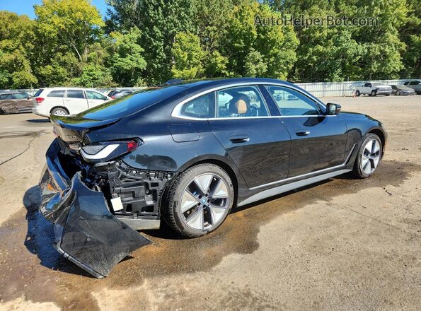 WBY43AW09RFT15359 2024 BMW I4 Угольный Задняя правая четверть