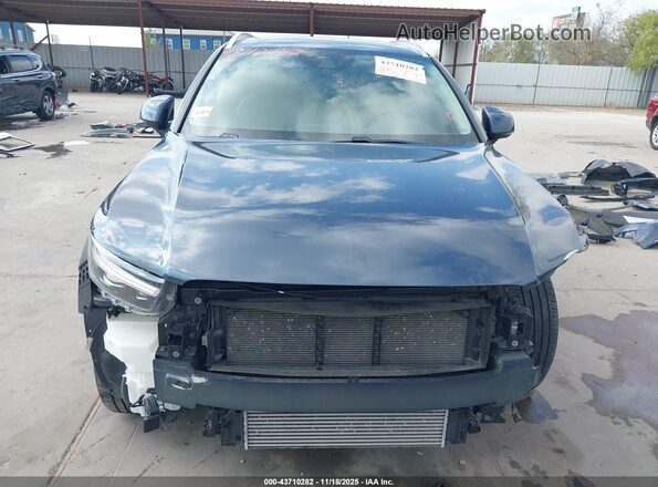 YV4162UL4N2697409 2022 VOLVO XC40 Dark Blue Vista interior trasera