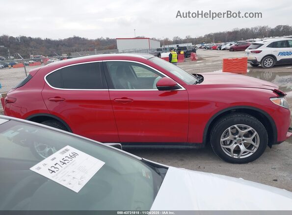 ZASPAKANXM7D18620 2021 ALFA ROMEO STELVIO Red Vista interior trasera