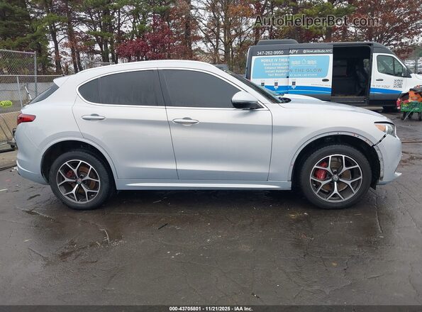 ZASPAKBN0M7D14705 2021 ALFA ROMEO STELVIO Silver Rear interior view
