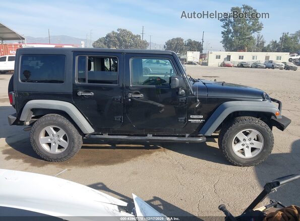 1C4BJWDG0GL128120 2016 JEEP WRANGLER UNLIMITED Black Rear interior view