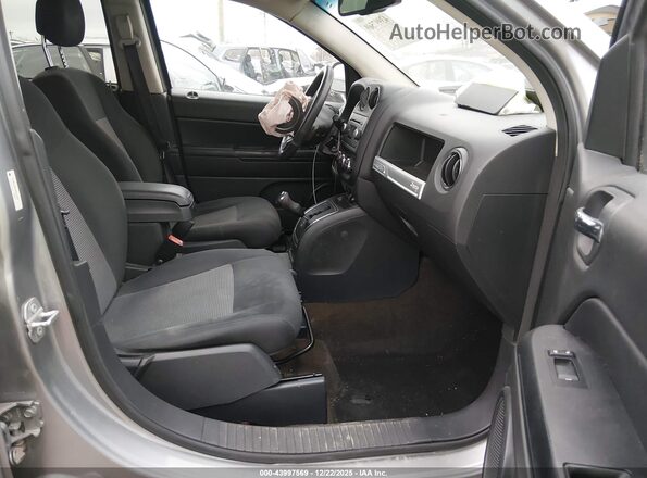 1C4NJCBA1GD611538 2016 JEEP COMPASS Silver Vista interior delantera