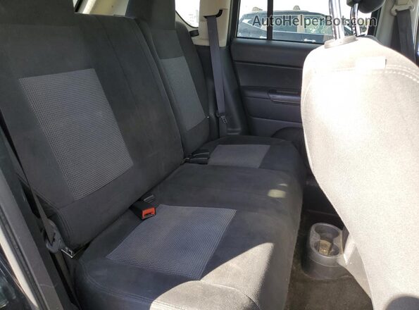 1C4NJDBB8GD566547 2016 JEEP COMPASS Black Widok wnętrza z tyłu