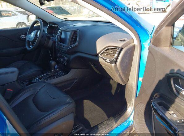 1C4PJMMB2PD106869 2023 JEEP CHEROKEE Blue Вид салону спереду