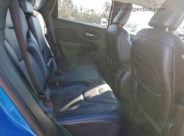 1C4PJMMB4PD110180 2023 JEEP CHEROKEE Blue Widok wnętrza z tyłu