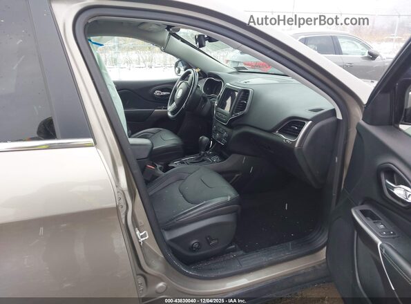 1C4PJMMX9MD154344 2021 JEEP CHEROKEE Tan Front interior view