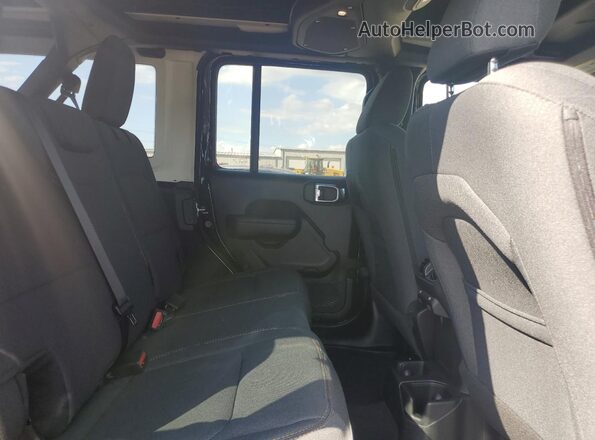 1C4PJXDG8SW557038 2025 JEEP WRANGLER Black Вид задньої частини салону