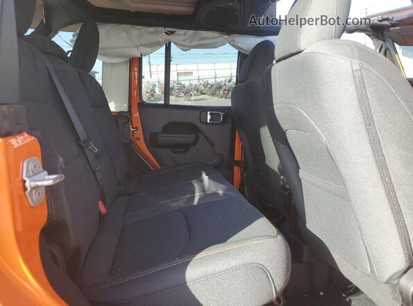 1C4RJXN60SW595359 2025 JEEP WRANGLER Оранжевый Вид задней части салона