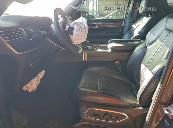 1C4SJVAP9PS561570 2023 JEEP WAGONEER Gray Vista interior delantera