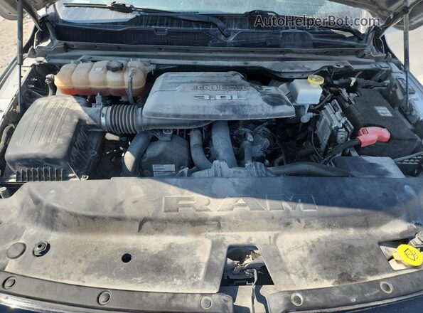1C6RREJM4NN187627 2022 DODGE RAM Серебряный Вид задней части салона