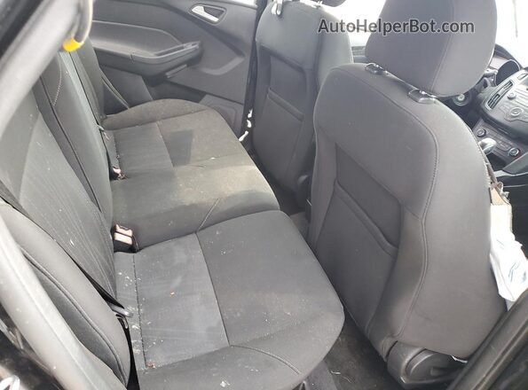 1FADP3K22GL205721 2016 FORD FOCUS Black Rear seats view