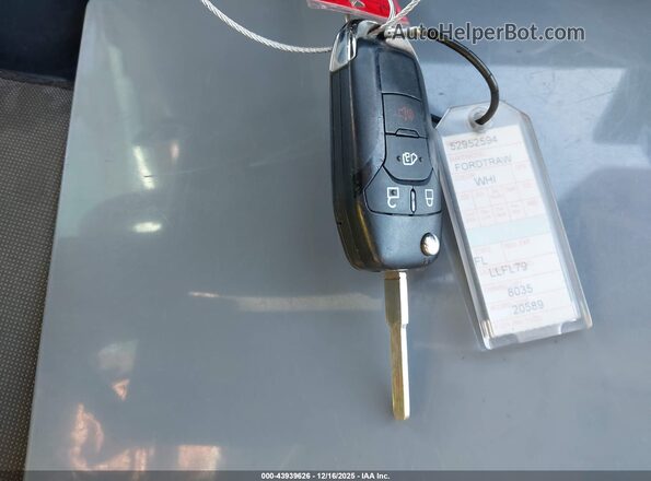 1FBAX2YG2PKB08085 2023 FORD PASSENGER White Dashboard view
