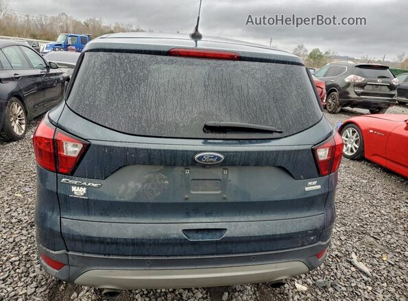 1FMCU0GDXKUB14752 2019 FORD ESCAPE Серый Вид сзади