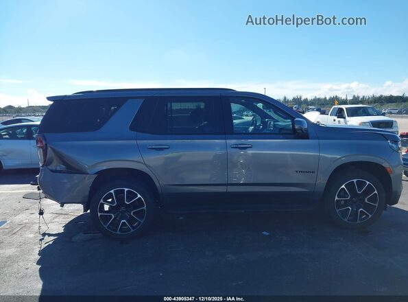 1GNSCRKDXMR287778 2021 CHEVROLET TAHOE Gray Vista interior trasera