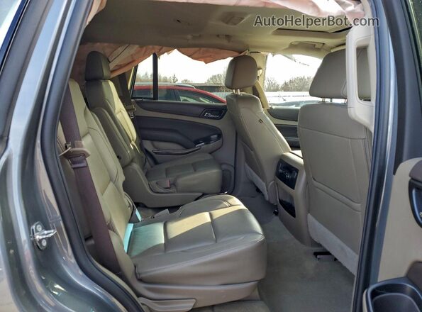 1GNSKBKC7JR379007 2018 CHEVROLET TAHOE Серый Вид задней части салона