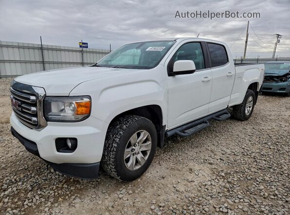 1GTG6CENXJ1113064 2018 GMC CANYON Белый Передняя левая четверть