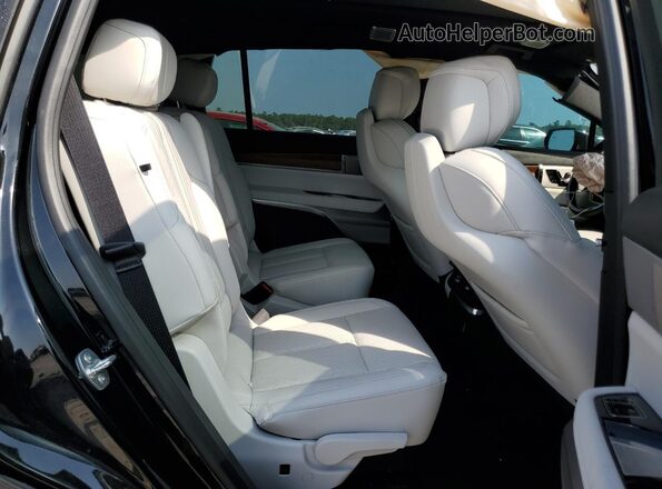 1GYC3NML4TZ700989 2026 CADILLAC VISTIQ Черный Вид задней части салона