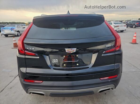 1GYFZCR48MF083052 2021 CADILLAC XT4 Черный Вид сзади