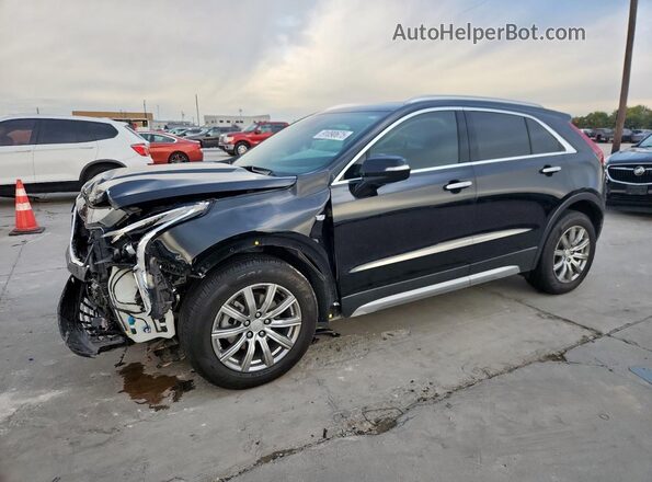 1GYFZCR48MF083052 2021 CADILLAC XT4 Черный Передняя левая четверть