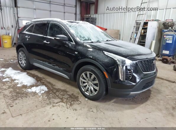 1GYFZDR40MF035387 2021 CADILLAC XT4 Black Front right