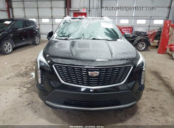 1GYFZDR40MF035387 2021 CADILLAC XT4 Black Front view