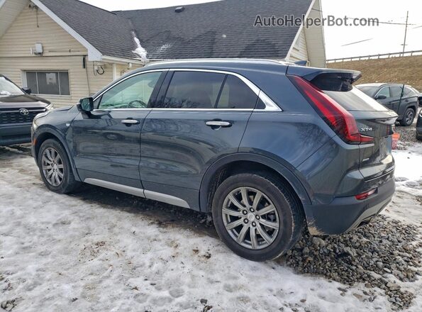 1GYFZDR43MF030233 2021 CADILLAC XT4 Blue Trasero derecho