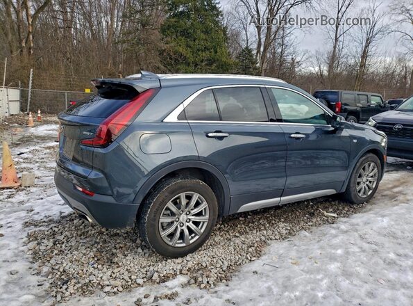 1GYFZDR43MF030233 2021 CADILLAC XT4 Blue Delantero derecho