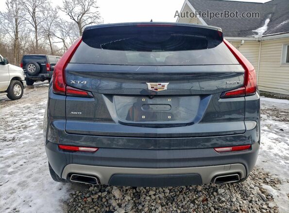 1GYFZDR43MF030233 2021 CADILLAC XT4 Blue Vista interior delantera