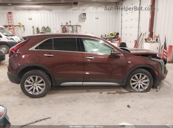 1GYFZDR47NF111043 2022 CADILLAC XT4 Фиолетовый Вид задней части салона
