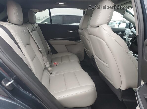 1GYFZDR4XMF019150 2021 CADILLAC XT4 Charcoal Vista interior trasera