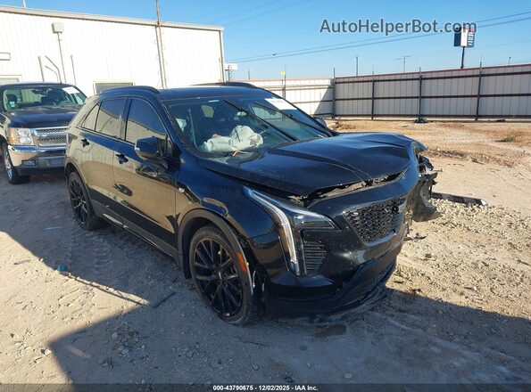 1GYFZER47NF104583 2022 CADILLAC XT4 Черный Передняя правая четверть