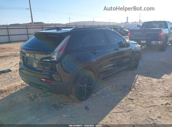 1GYFZER47NF104583 2022 CADILLAC XT4 Черный Задняя правая четверть