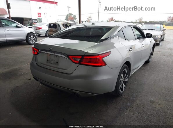 1N4AA6AP4GC433593 2016 NISSAN MAXIMA Серебряный Задняя правая четверть