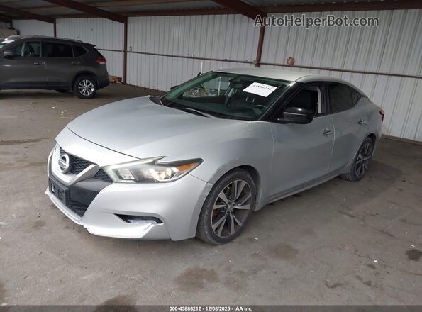 1N4AA6AP4GC433593 2016 NISSAN MAXIMA Серебряный Передняя левая четверть