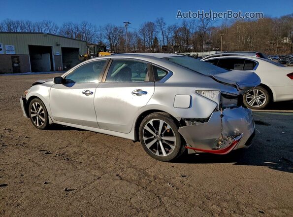 1N4AL3AP9GC128437 2016 NISSAN ALTIMA Silver Trasero izquierdo