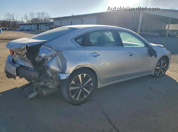 1N4AL3AP9GC128437 2016 NISSAN ALTIMA Silver Trasero derecho