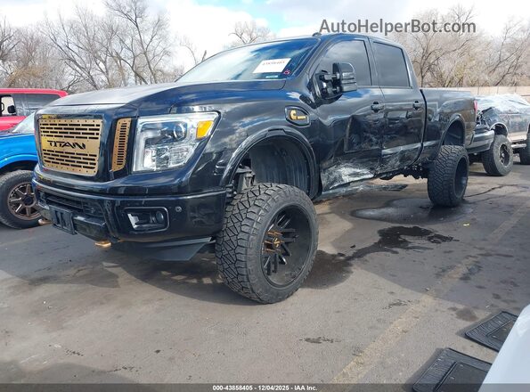 1N6BA1F46HN506997 2017 NISSAN TITAN XD Черный Передняя левая четверть