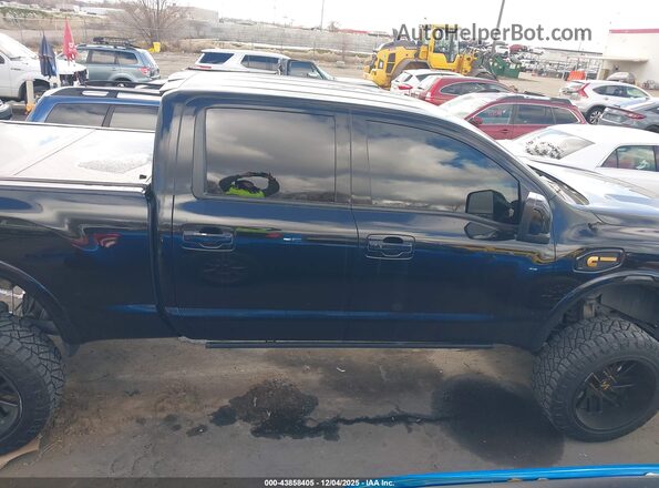 1N6BA1F46HN506997 2017 NISSAN TITAN XD Черный Вид задней части салона
