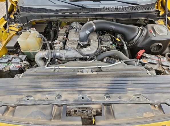 1N6BA1F47GN509342 2016 NISSAN TITAN Желтый Вид задней части салона