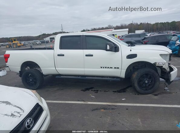 1N6BA1F4XKN524068 2019 NISSAN TITAN XD Белый Вид задней части салона