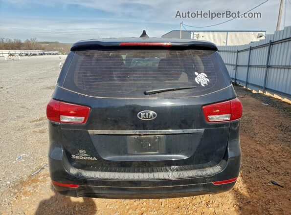 KNDMA5C10J6363722 2018 KIA SEDONA Black Вид салону спереду