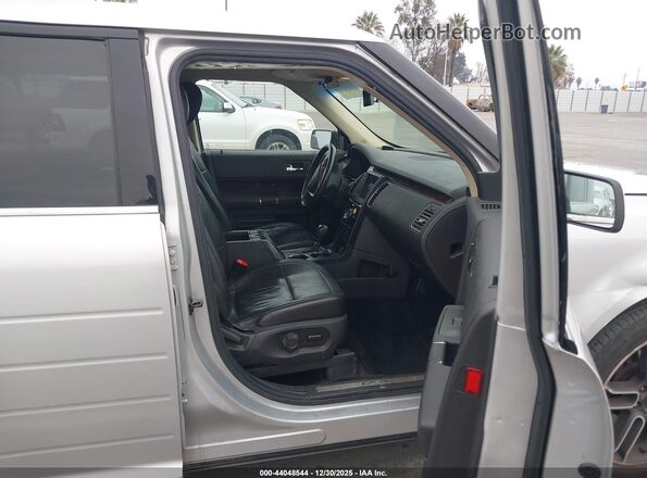 2FMGK5D81JBA07377 2018 FORD FLEX Серебряный Вид салона спереди