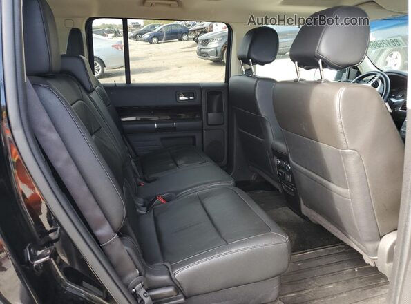 2FMHK6C86HBA09017 2017 FORD FLEX Black Vista de los asientos traseros