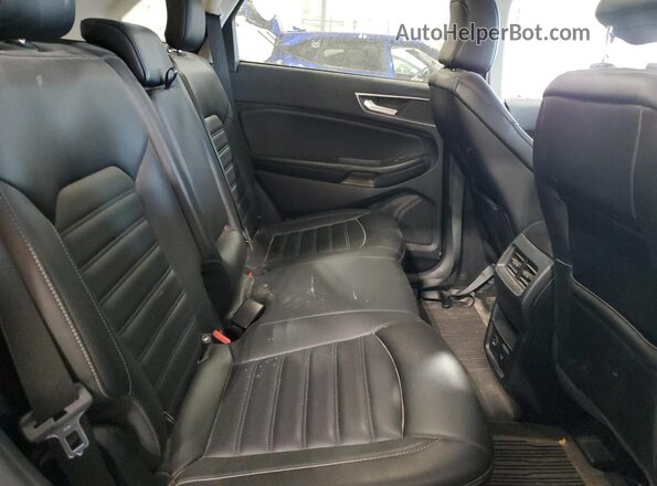 2FMPK4J99NBA76928 2022 FORD EDGE Blue Вид задньої частини салону