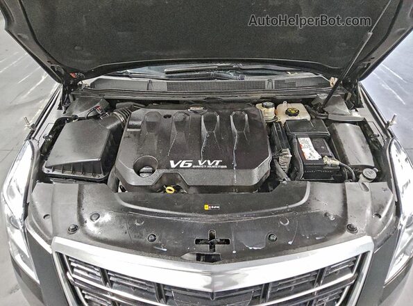 2GEXG7U32H9500371 2017 CADILLAC XTS Черный Вид задней части салона
