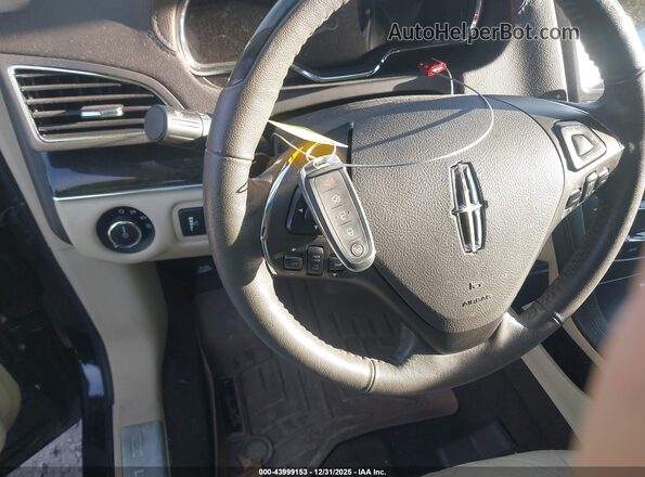 2LMHJ5AT9KBL01888 2019 LINCOLN MKT Черный Вид панели приборов